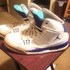 Pair of purple & white Jordans 11.5